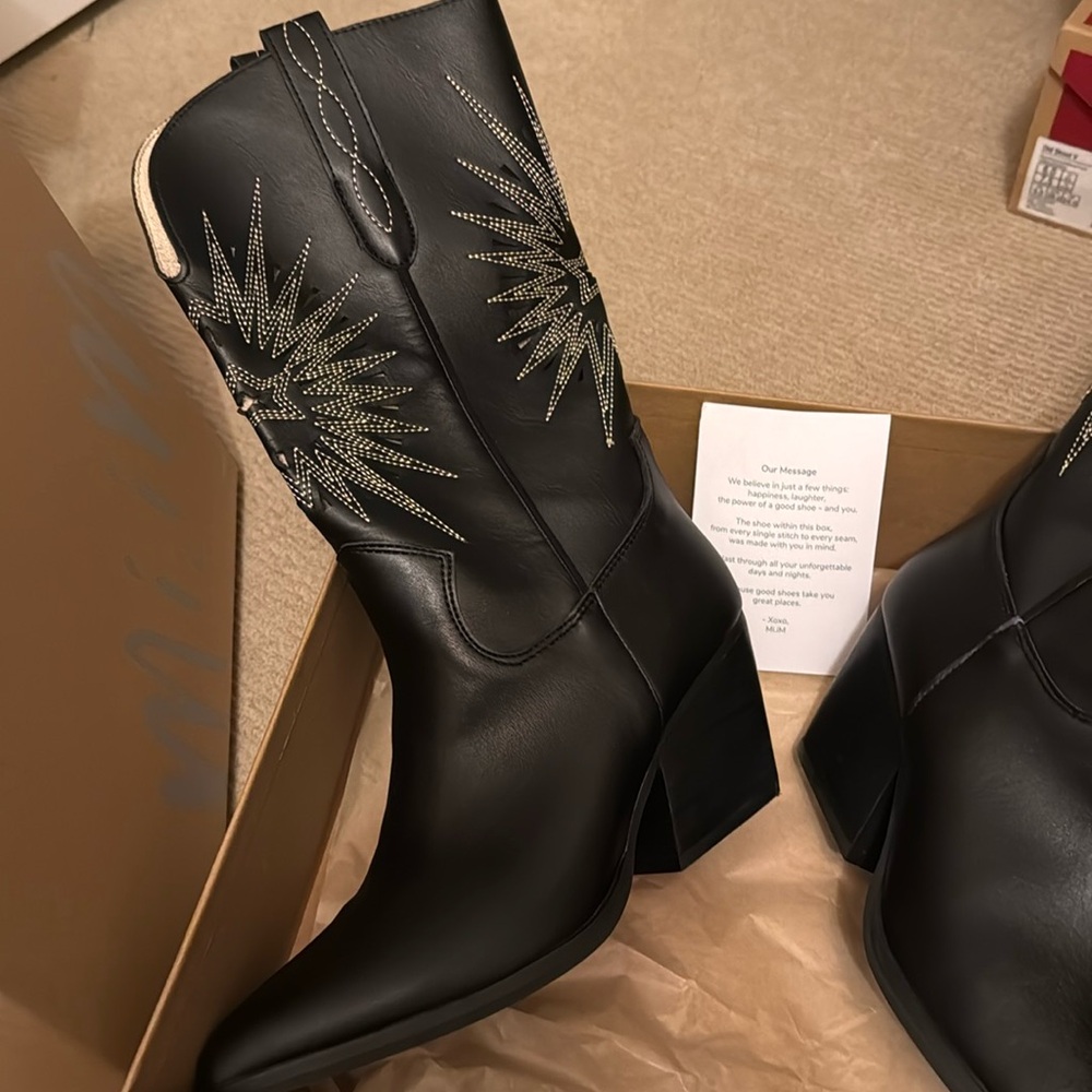 Black shin high cowboy boots